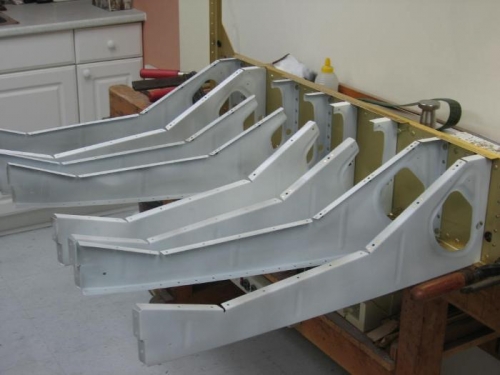 Seat ribs rivet to F-704 Bulkhead