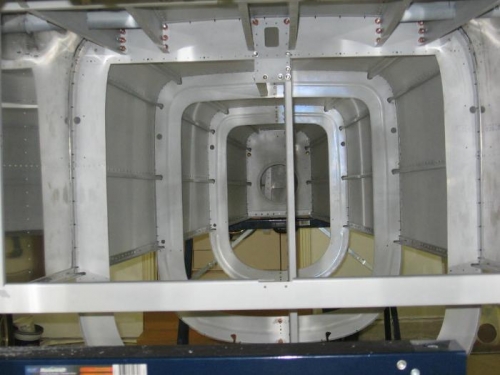 F-770 & F-773 side skins match drilled to the F-718 longeron