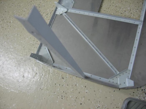 F-719 longeron riveted to F-719B angle clip and firewall