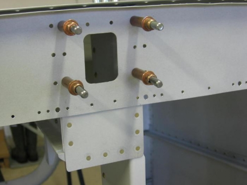 F-730 reinforcement plate riveted to F-728 bellcrank channel