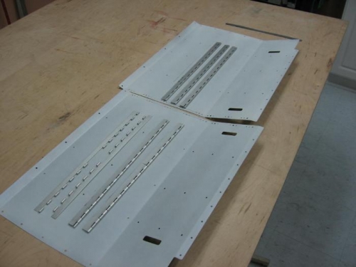 F-742 seat bottom panels marked and hinges trimmed