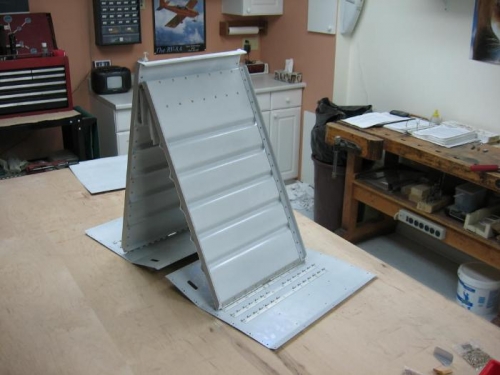 Seat assemblies riveted