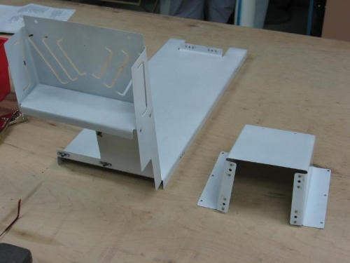 Forward cabin covers riveted and nut plated