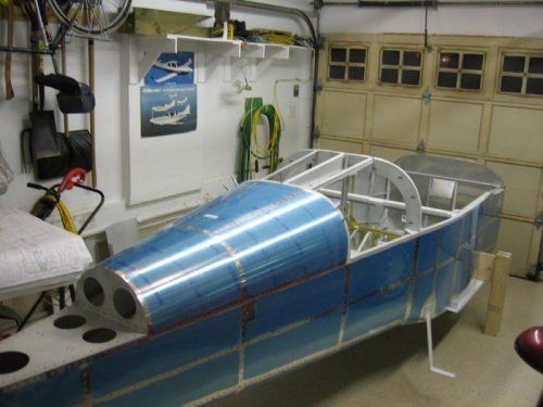 Aft upper fuselage skin riveting complete