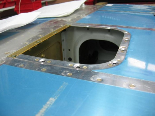 Wing inspection panel nut plates installed