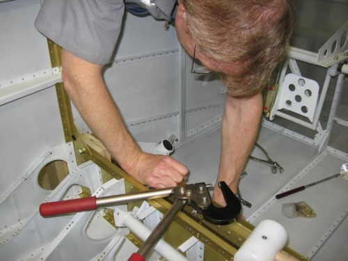 Installing rivets prior to squeezing them