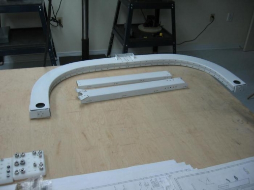 Rollover bar and flap motor channel riveted