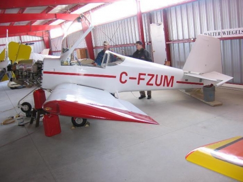 Aircraft tail lowered to the ground to conduct the fuel flow test with minimum fuel in the tank
