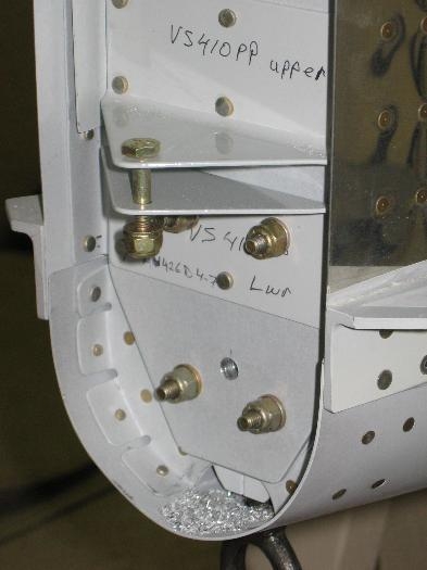 Started tail nav and strobe light wire routing through the tail by drilling the bulkheads
