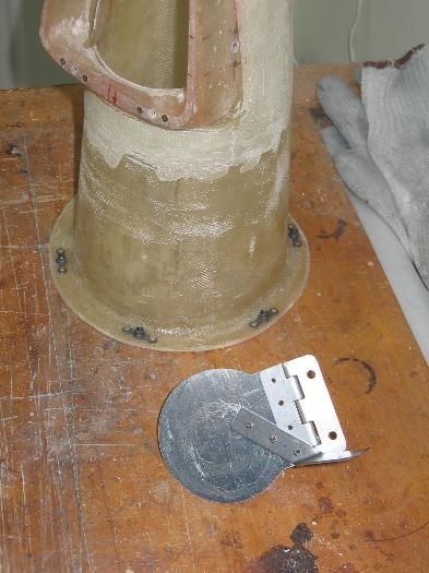 Engine induction air filter housing nut plates installed and alternate air selector valve fabricated