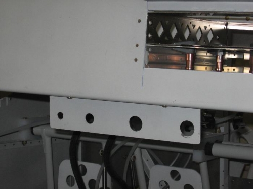 Engine control cable mounting bracket drilled and installed