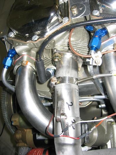 Exhaust pipe removed, EGT probe hole deburred and pipe reinstalled