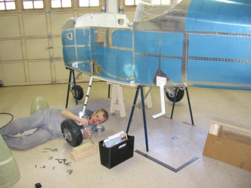 Marking the hole locations on the main wheel fairing attach brackets