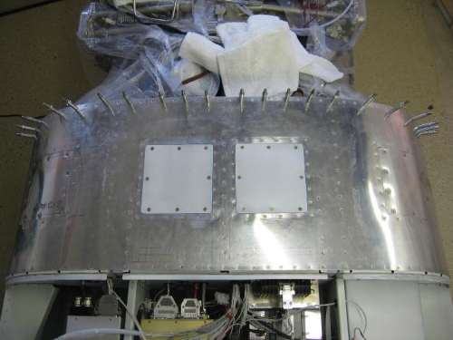 Forward upper fuselage deck access panel form-a-gasket applied