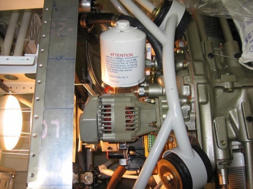 Back up alternator installed on the vacuum pump pad