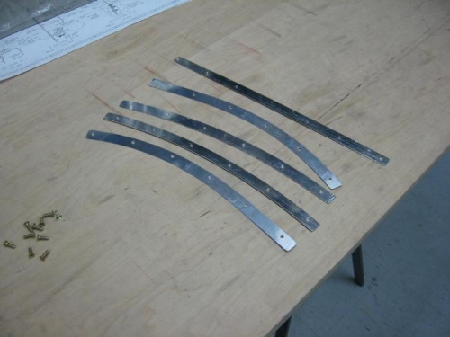 Retaining screw backing stips edge finished and deburred