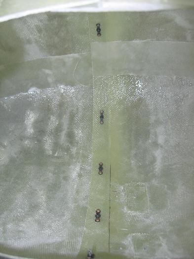 Wheel fairing anchor nuts riveted in