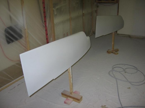 Wing tip fairing sprayed with a second primer coat