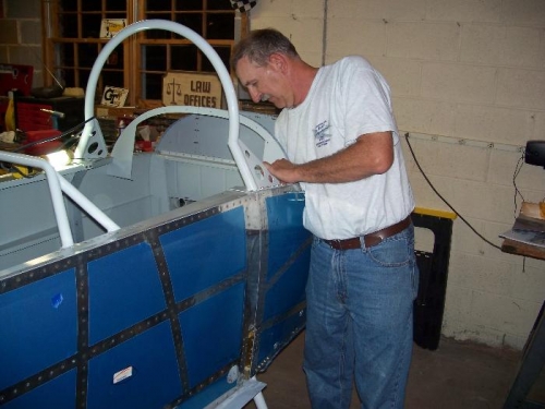 Jim Weed, preparing the center section for the wing fitting