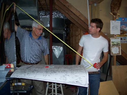 Patrick and I checking the distance between the vertical stabilizer tip and the horiz. stabilizer tip