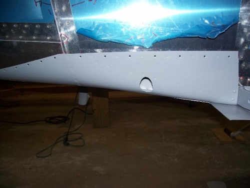 I primed the right side of the fuselage that will be covered by the flap fairing