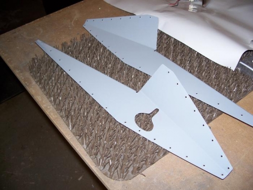 Inside of the flap fairings, all prime and ready to rivet to the fuselage