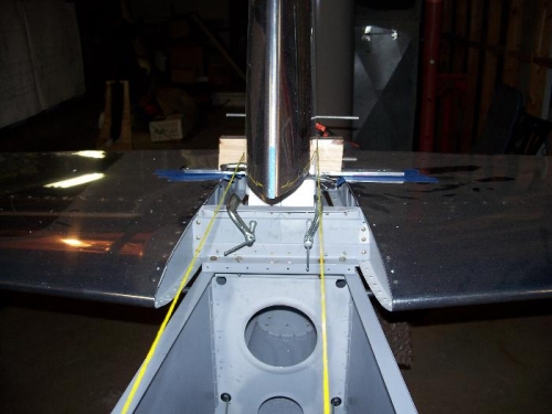 VS clamped in between 2 strings centered in the fuselage