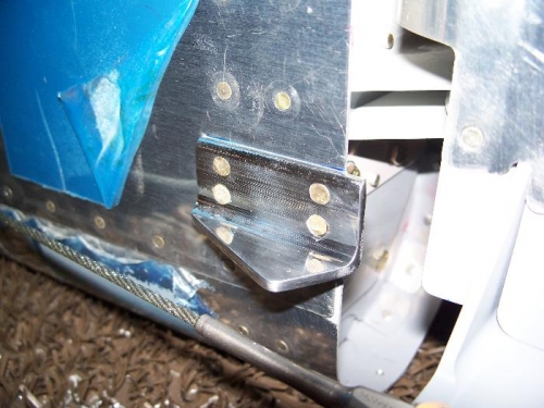 The polished rudder stop, all snugly riveted on