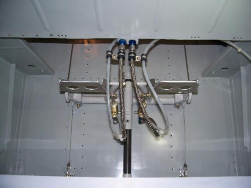 Top view of the rudder pedals with the brake plumbing