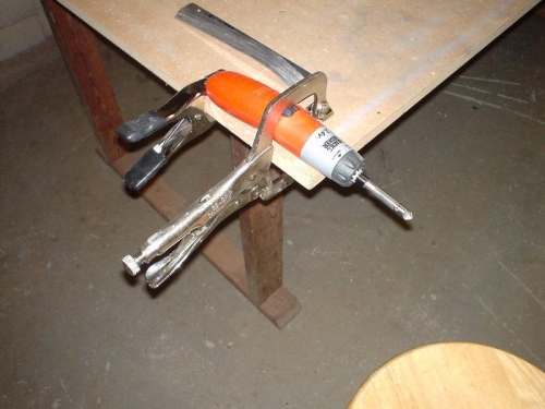 Deburring tool, clamped to the work bench