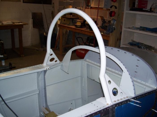 The windshield bow/roll bar bolted into place