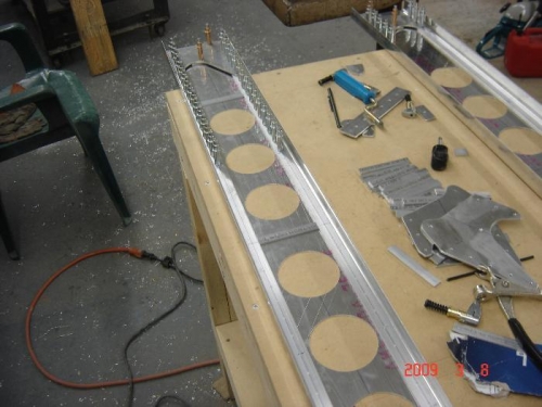 Match drilling cap strips to web