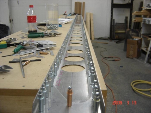 Right rear spar with front and aft cap strips ready to drill with #30 drill bit