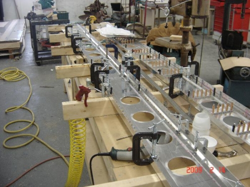 Working on drilling left main spar