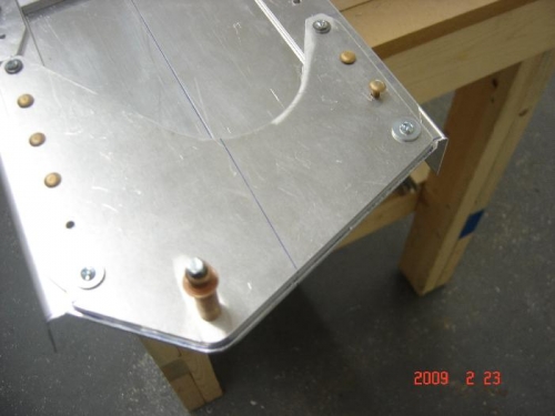 Ruff cut out of web on attach plate end