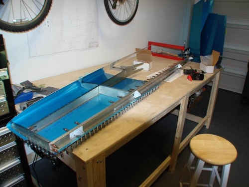 The bottom of the left HS skin is clecoed.