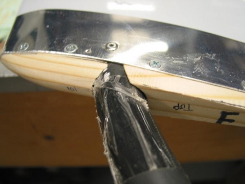 Leading edge of lower plug formed, trailing edge plug, rough cut