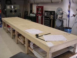 Jig table with everything laid out for the fuselage bottom.