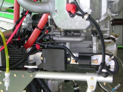 Spark plug wire clamp