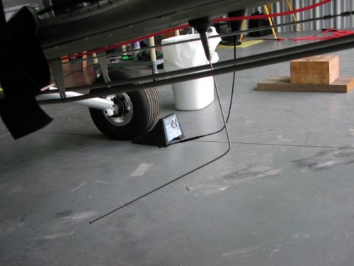 Antennas mounted beneath floor pan