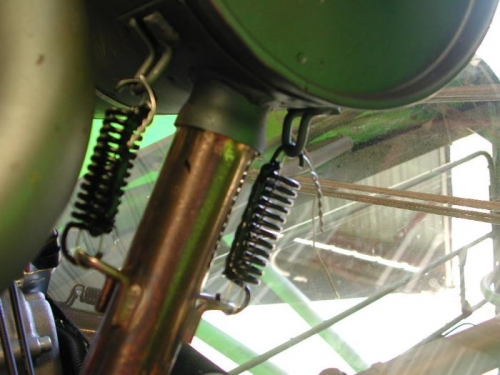 Safety wired muffler springs