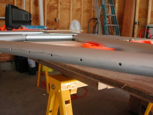 Rivet holes for fabric covering