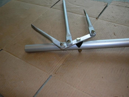 Crank bolted to cross brace