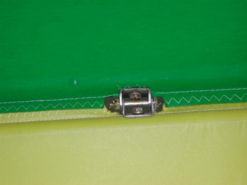 Excess fabric removed from hinge area