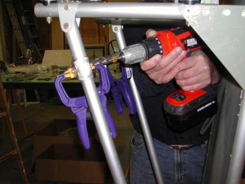 Drilling cross brace for bolt