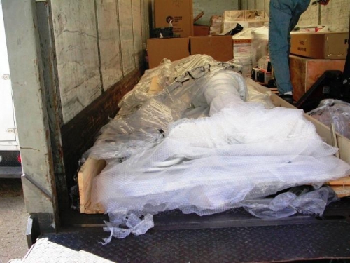 Wooden skid of parts