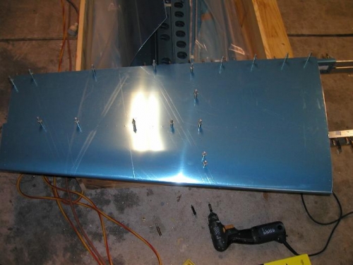 Horizontal skin fitted to allow HS-404, 405 to be marked for straitening and fluting