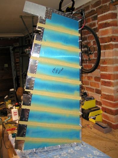 Side view of forward skins riveted in place