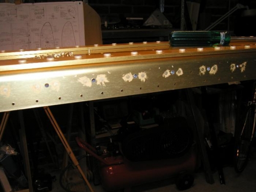 Counter sinks etch primed using a brush and nut plates for #8 screws riveted on