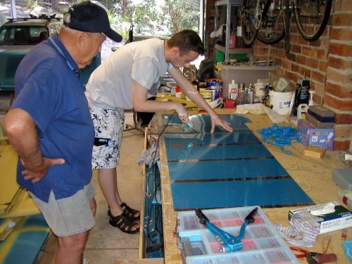 James at it with the soldering iron while my father looks on